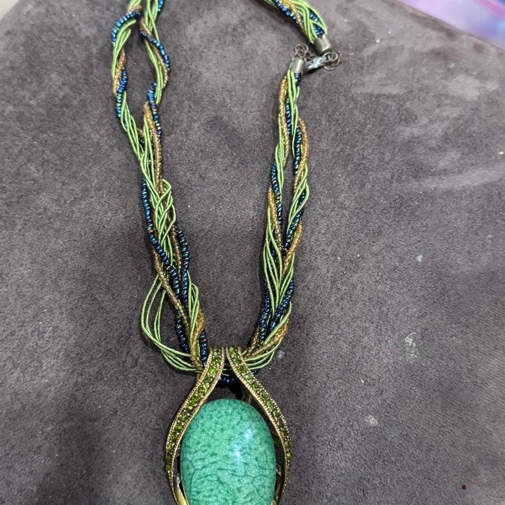 This item belongs to the contemporary artisan costume jewelry category